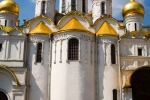 Mother and child dwarfed by the Assumption Cathedral Kremlin Mos